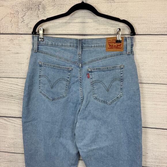 Levi's Women's High Waisted Medium Wash Mom Jeans Size 32 - Picture 6 of 8